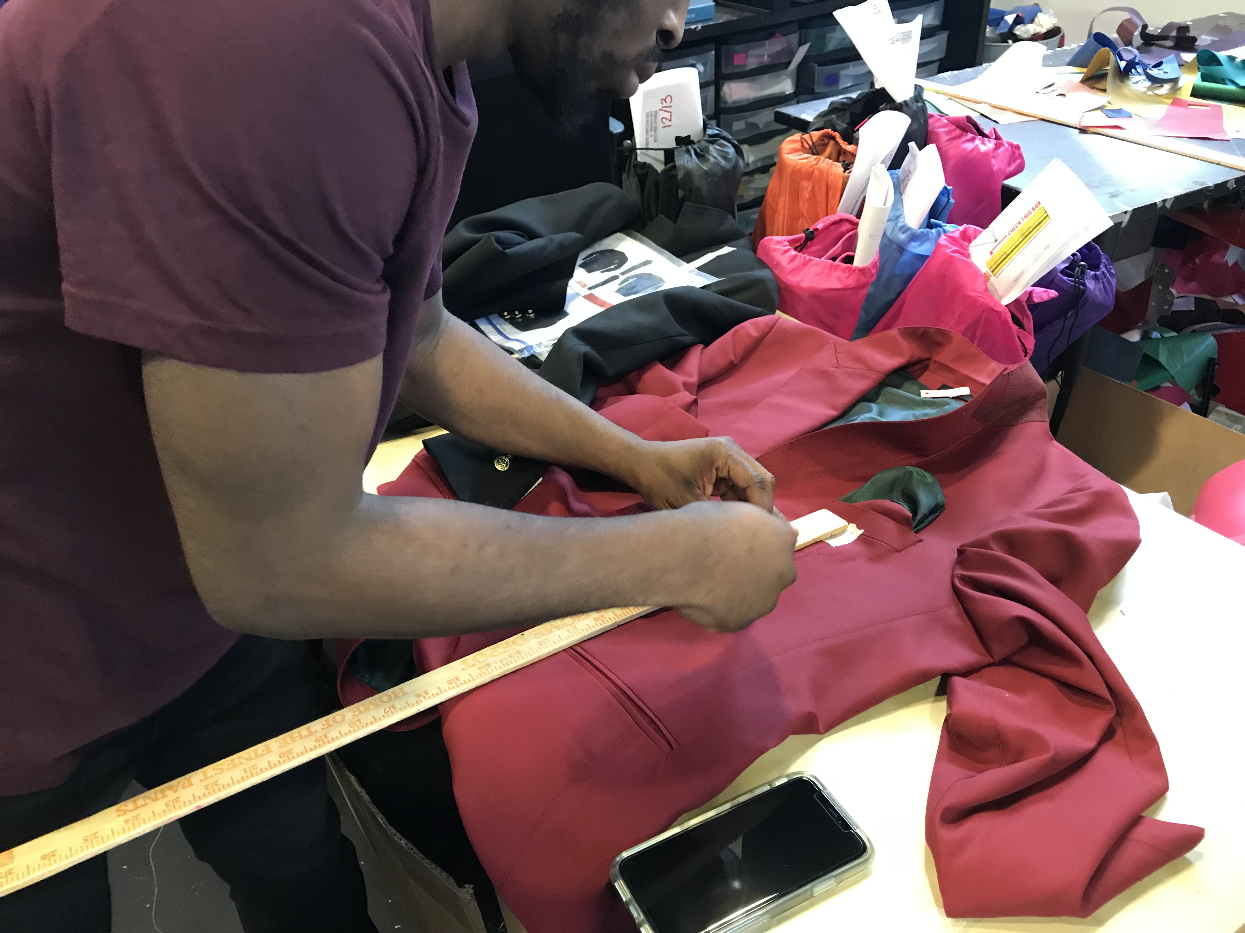 Learn to measure garments for accurate placement.